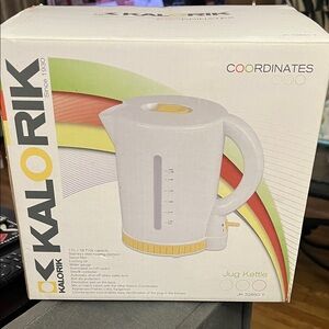 Kalorik White and Yellow Jug Kettle holds 58 Oz.